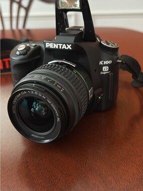 Pentax K100D Super DSLR Camera in Black with 18-55mm Lens